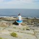 A Sissy Girl standing near the sea and enjoying during daytime