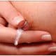 Beautiful lactating girl with breasts full of milk