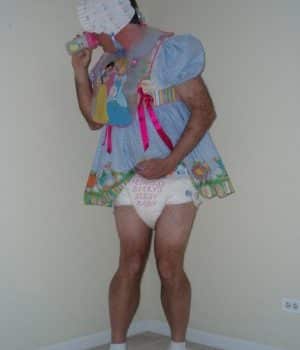 Boy wearing the baby adult diaper and sissy dress