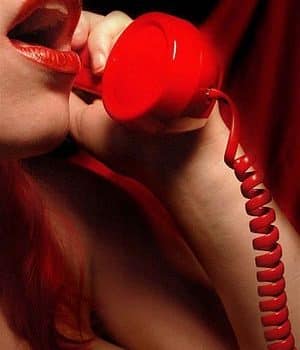 Hot Sensual Call Girl Talking on Red Phone