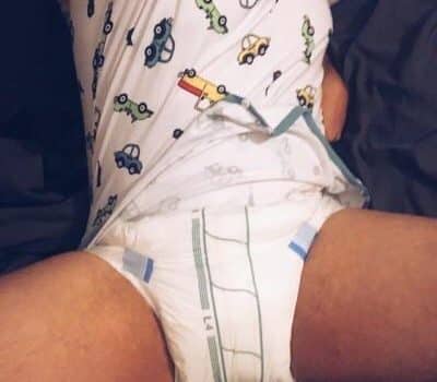 Boy wearing the baby adult wet diaper